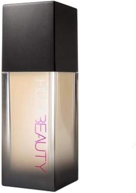 Perfume bottle with 'BEAUTY' text on a white background